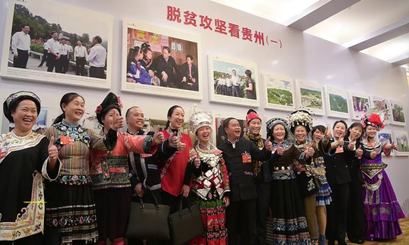 Guizhou photo exhibition themed on poverty relief held in Beijing